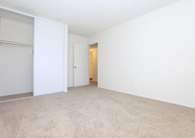 bedroom with closet at town and country gardens