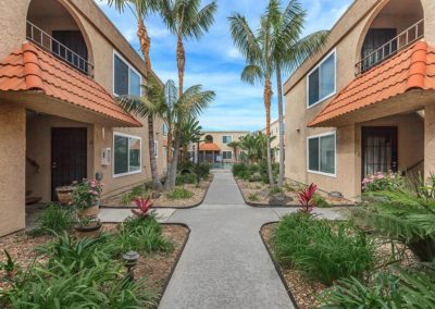 pathway at villa nova apartments with landscape