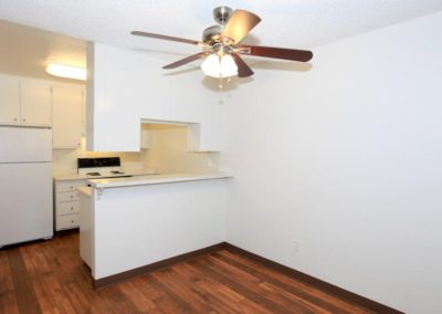 kitchen with ceiling fan at wells avenue