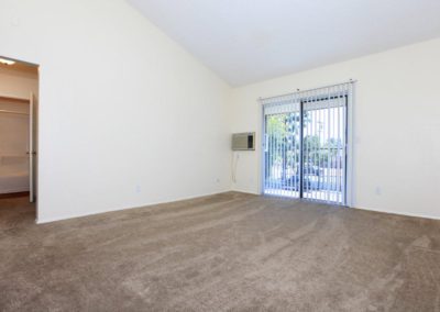 living area with sliding glass door at wells avenue