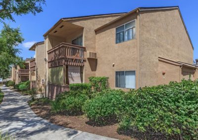 exterior of willow creek apartments and landscape